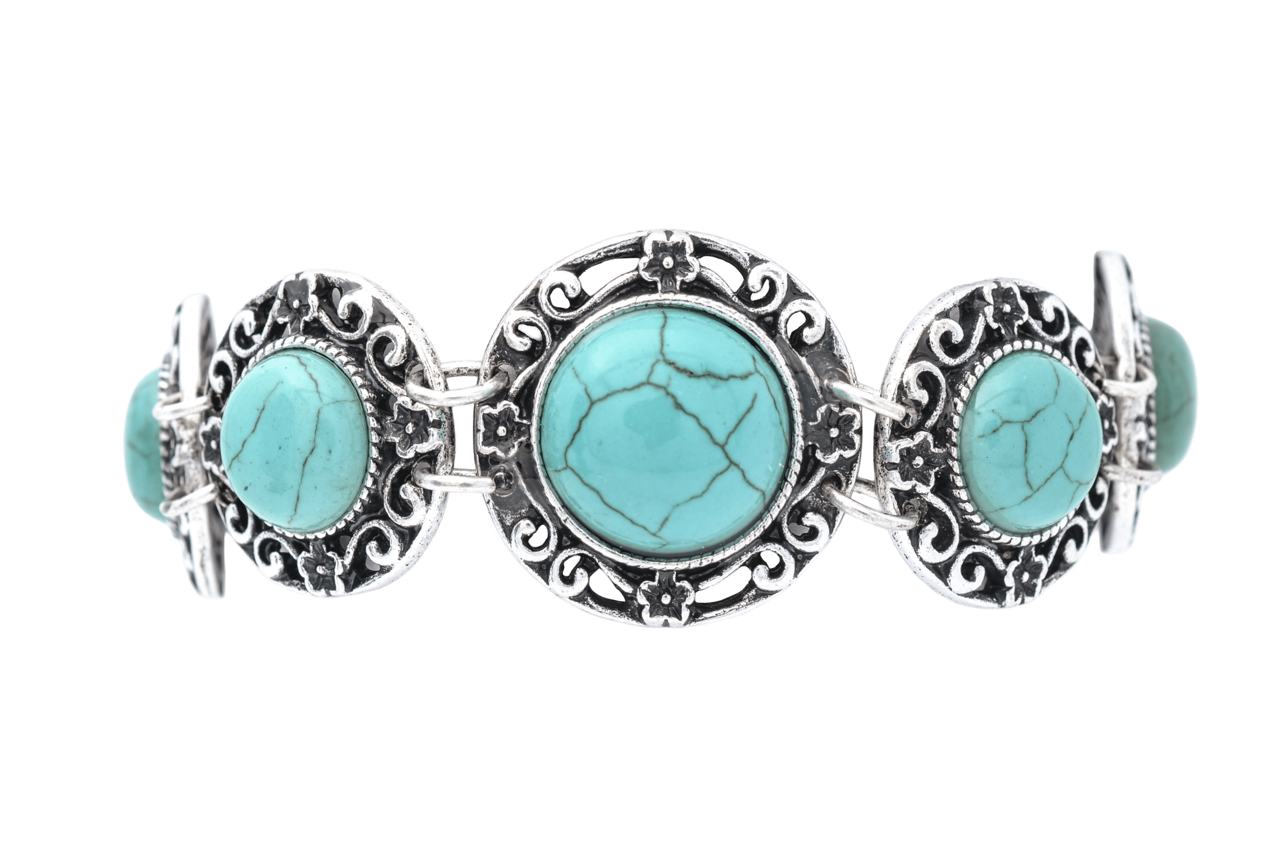 A silver bracelet with ornate floral designs, featuring circular turquoise stones with veins, set against a black background. Elegant and vintage style.